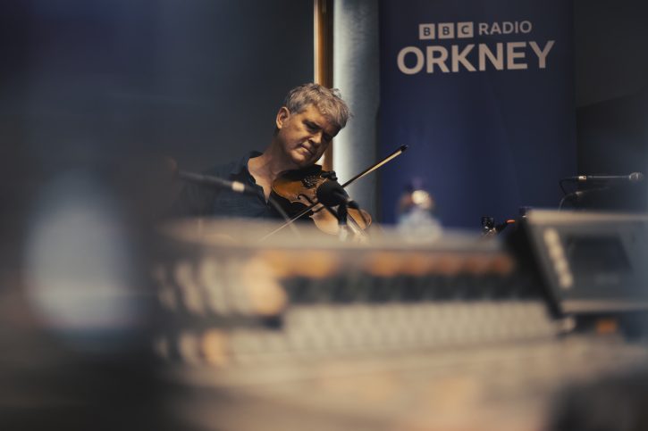 Dirk Powell, Cedric Watson and Amelia Powell at the Orkney Folk Festival 2026 - photographs by David at the Hall of Einar